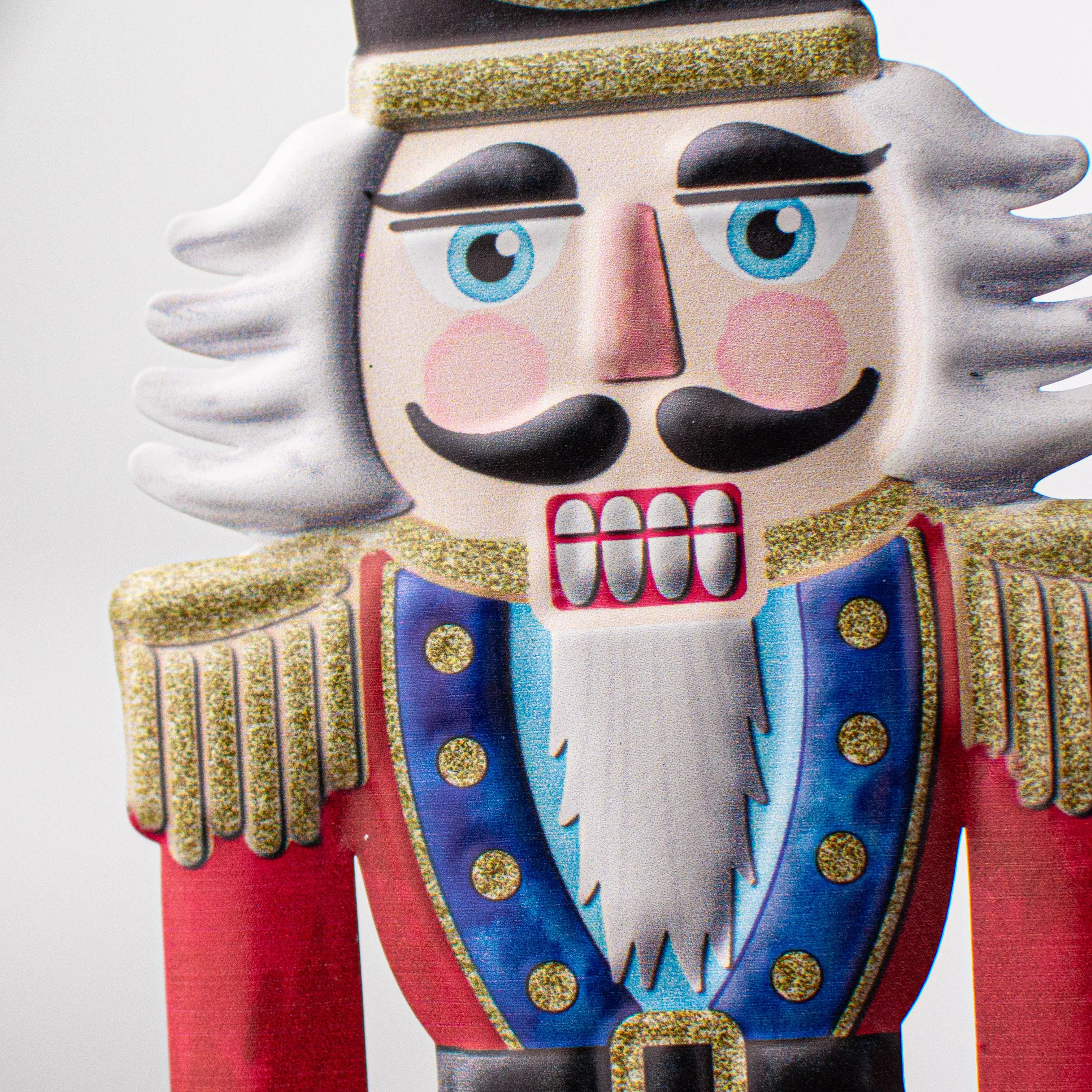 12" Metal Embossed Hanger: Nutcracker