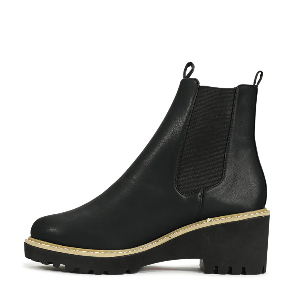 ARI WEDGE ANKLE BOOTS